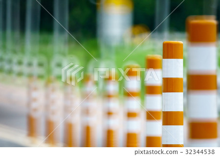 Flexible traffic bollard for bike lane. 32344538