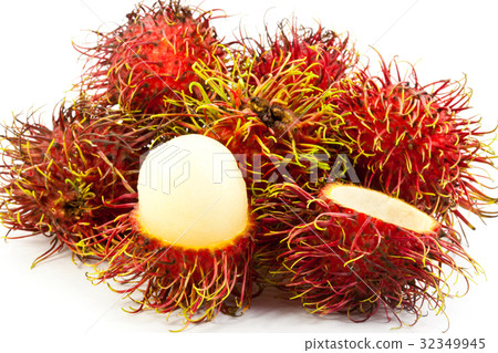 Closeup of whole and peeled rambutan Closeup of whole and peeled rambutan 32349945