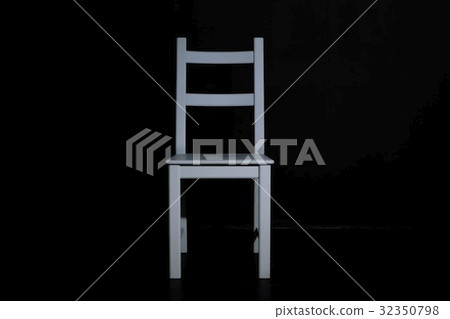 Chair in dark room Chair in dark room 32350798