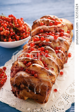 Sweet homemade bread with currant jam. 32351624