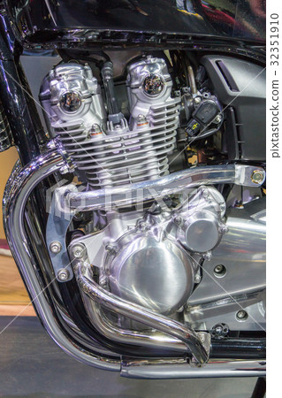 Motorcycle engine close-up detail background Motorcycle engine close-up detail background 32351910