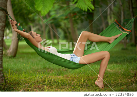 Taking Nap in Hammock Taking Nap in Hammock 32354886
