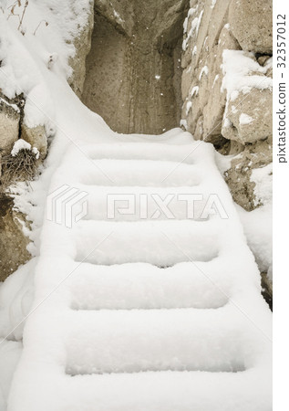 Stairs under snow in winter 32357012