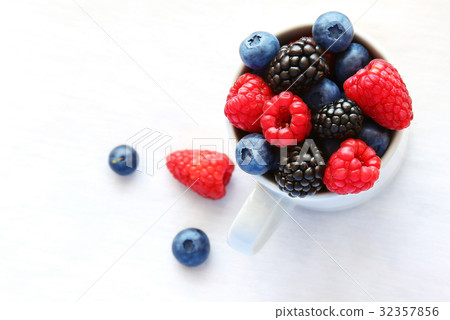 Blueberries, raspberries and blackberries 32357856
