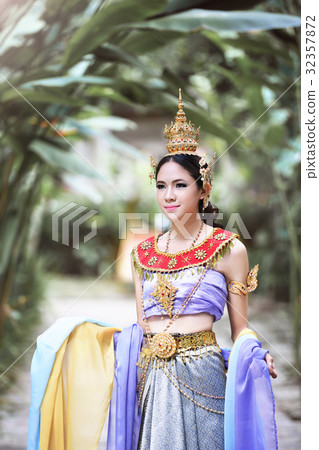 Beautiful Thai girl in Thai traditional costume Beautiful Thai girl in Thai traditional costume 32357872