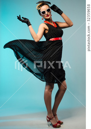 Young beautiful woman in retro pin-up style 32359658