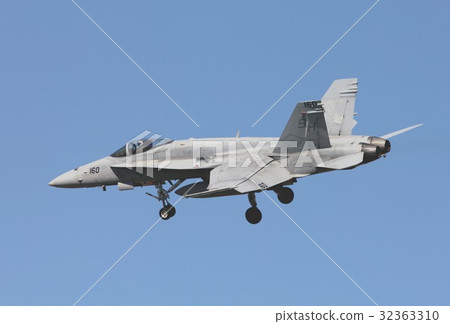 A US Marine aircraft carrier aircraft flying in the blue sky of California F - 18C Hornet battle attack machine A US Marine aircraft carrier aircraft flying in the blue sky of California F - 18C Hornet battle attack machine 32363310