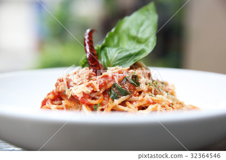 Spaghetti with tomato sauce and fresh basil on wood , Italian pasta Spaghetti with tomato sauce and fresh basil on wood , Italian pasta 32364546