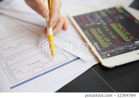 Office Woman hand Working on the Business Papers and tablet 32364764