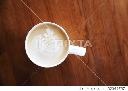 cappuccino coffee on wood background 32364767