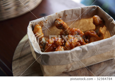 Buffalo wings on wood background 32364784