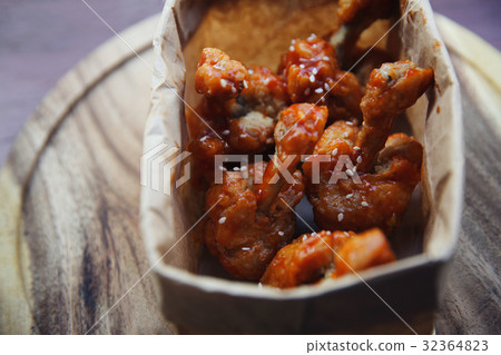 Buffalo wings on wood background 32364823