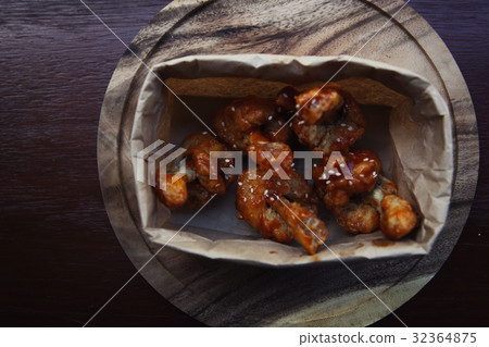 Buffalo wings on wood background 32364875
