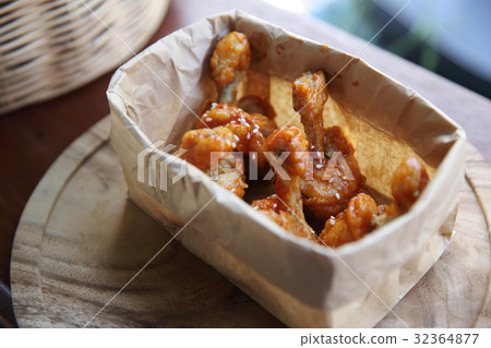 Buffalo wings on wood background Buffalo wings on wood background 32364877