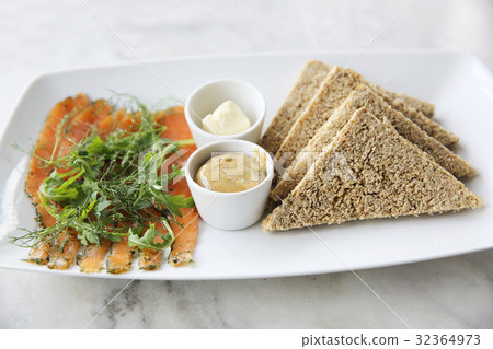 Smoked salmon gravlax with bread Smoked salmon gravlax with bread 32364973