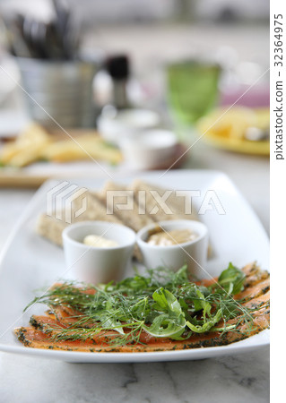 Smoked salmon gravlax with bread 32364975