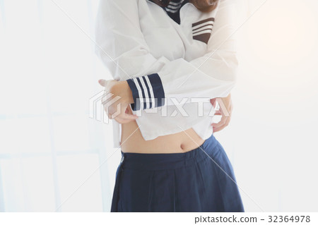 One asian school girl dressing up in white tone and flare 32364978