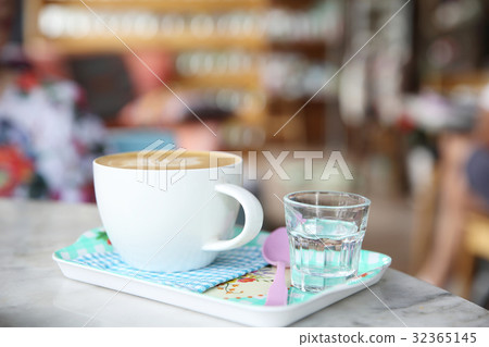 cappuccino coffee on wood background 32365145