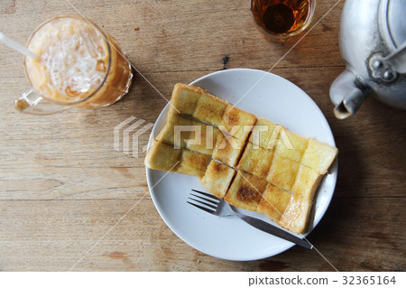 Local morning Thai food hot tea, soft boiled eggs and toast Local morning Thai food hot tea, soft boiled eggs and toast 32365164