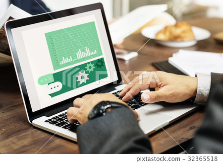Hands working on laptop network graphic overlay 32365518