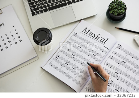 Hands working on notebook network graphic overlay 32367232