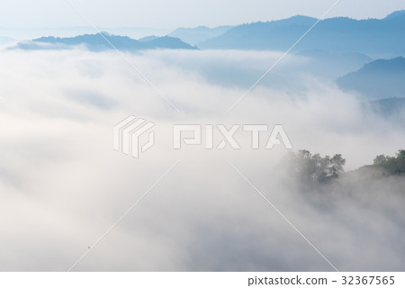 View of amazing mist moving over mountains View of amazing mist moving over mountains 32367565