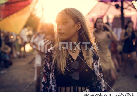 Woman Standing in Music Festival Woman Standing in Music Festival 32368861