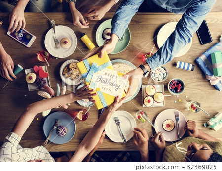 Man Giving Birthday Wishing Card to Friend 32369025