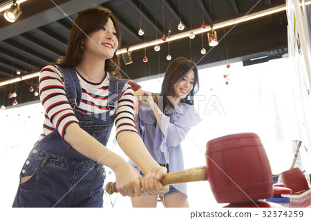 Young Girl, Game Center Young Girl, Game Center 32374259