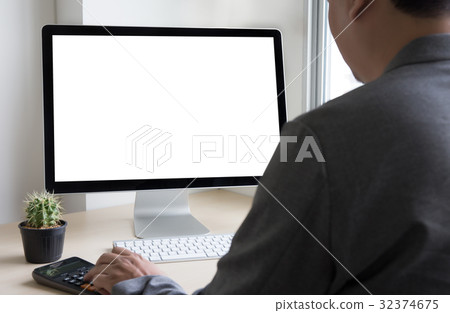 young man working Businessman using a desktop young man working Businessman using a desktop 32374675
