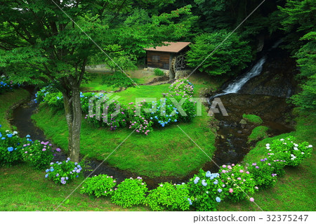 Waterfall and water mill 32375247