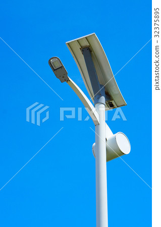 Solar energy light pole road with blue sky backgro 32375895
