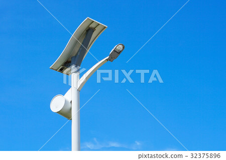 Solar energy light pole road with blue sky backgro 32375896