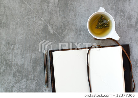 Notebook and tea 32377306