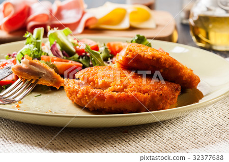 Cutlet Cordon Bleu with salad 32377688