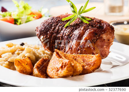 Pork knuckle with fried sauerkraut 32377690