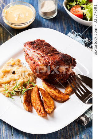 Pork knuckle with fried sauerkraut 32377691