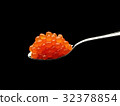 Red caviar on a spoon 32378854
