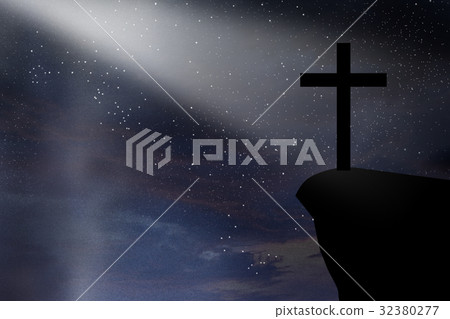 Cross against night sky 32380277