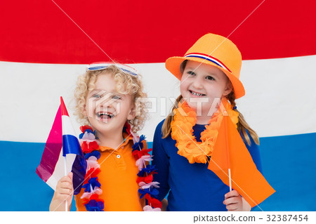 Dutch kids. Children with flag of Netherlands. 32387454