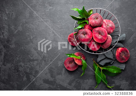 Peach, fresh peaches with leaves Peach, fresh peaches with leaves 32388836