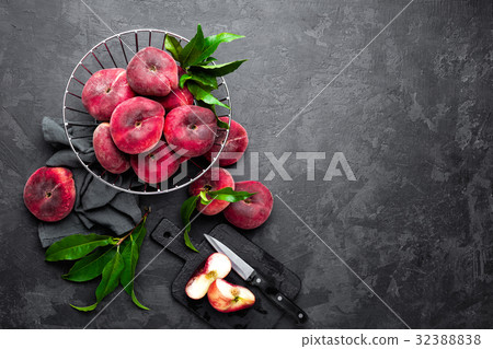 Peach, fresh peaches with leaves Peach, fresh peaches with leaves 32388838