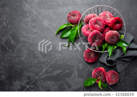 Peach, fresh peaches with leaves Peach, fresh peaches with leaves 32388839