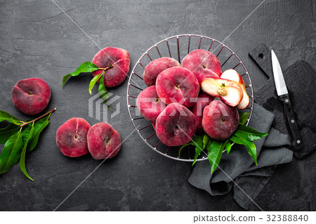 Peach, fresh peaches with leaves Peach, fresh peaches with leaves 32388840