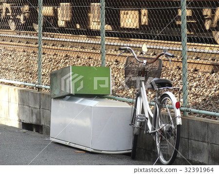 Coarse garbage dumped illegally along the track 32391964