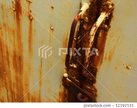 Rusted steel door of warehouse Rusted steel door of warehouse 32392535