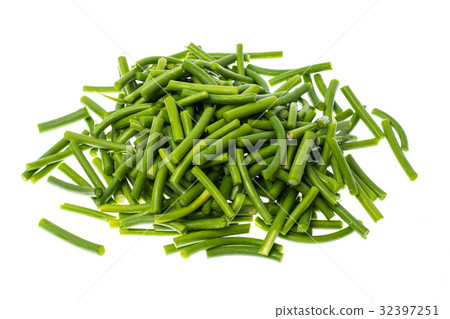 Green chopped pods of beans on white background Green chopped pods of beans on white background 32397251