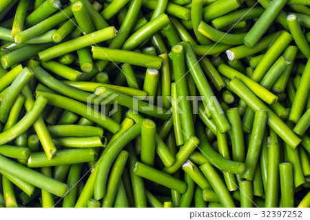 Green chopped pods of beans on white background Green chopped pods of beans on white background 32397252