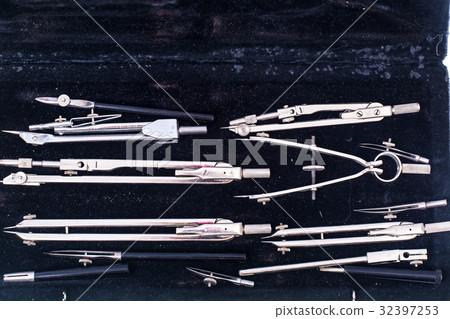 Set of drawing metal compasses in black box Set of drawing metal compasses in black box 32397253