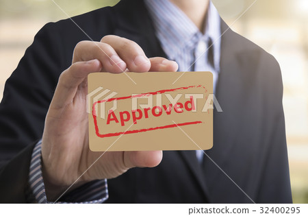 Businessman holding paper writed approved. Businessman holding paper writed approved. 32400295